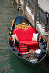 Venice, Italy: Traditional gondola in venetian water canal, close-up © Olaf