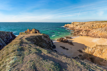 Rocks and sandy beach at Porz Chudel bay bay in southwestern part of Houat island in French Brittany.