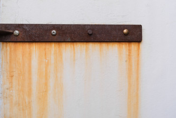Abstract background. Closeup rusty metal detail on a white background