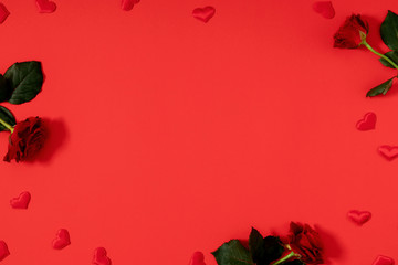 Beautiful flowers composition. Red rose, rose petals on red background. Valentine's Day, Happy Women's Day. Flat lay, top view, copy space