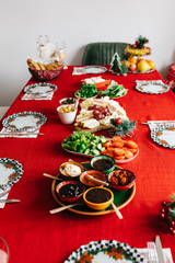 New Year Breakfast at home. Homemade Breakfast with family with red background. Traditional Turkish Breakfast. ( Selective focus)
