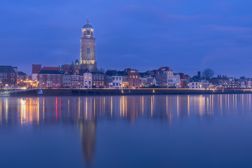 Fototapeta na wymiar Deventer skyline, blue hour at the river IJssel