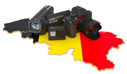 Travel and photo, video shooting in Belgium. Digital camera, camcorder and action camera on Belgian map. 3D rendering