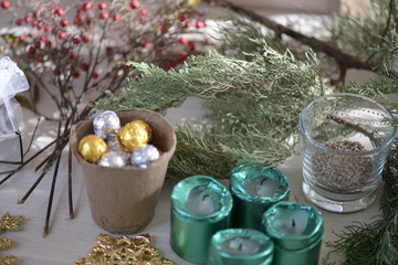 Fototapeta na wymiar window, candles, berries, decorations, crafts, stars, snowflakes, white, curtains, flickering, holiday, comfort, interior, holiday, coniferous branches, bucket, balls, gold, silver, green, relaxation
