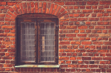 Abstract image of old brick wall background with window.