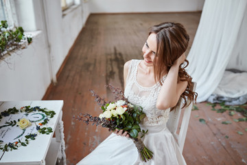 beautiful tender wedding bouquet of cream roses and eustoma flowers