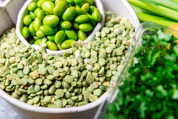 Variety of Green Vegetables and Fruits on the grey background