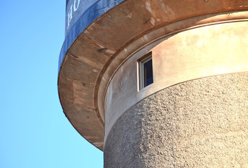 Fototapeta premium Corner of a large concrete water tower in Mildura with a tiny window in it