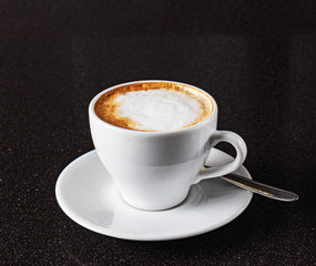 cappuccino on the black background