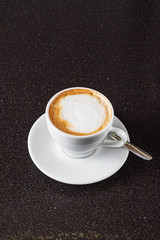 cappuccino on the black background
