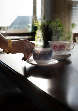 Woman drinking hot cup of beverage 