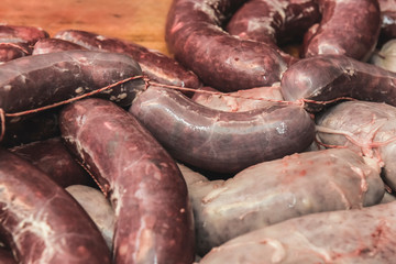 Handmade pork sausages finished on the table.