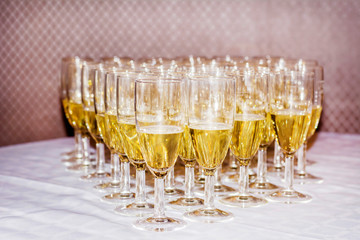 A Lot of Glasses of Champagne on a Table