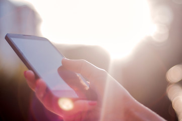 woman holding a smartphone