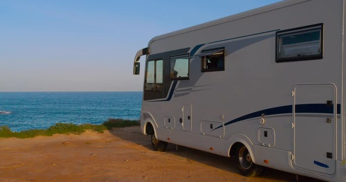 RV, Recreational vehicle, camping at the beach.