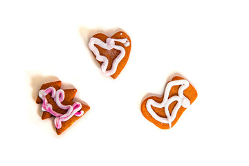 Various gingerbreads on a white background. The concept of eating gingerbread, baking.