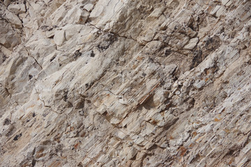 Close-up view of the sandstone bluffs at an ocean beach in California