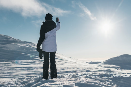 Person In Mountains Taking Photos