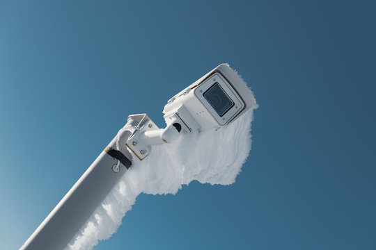 Security camera covered with snow