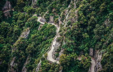 Fototapeta na wymiar Path near Santa Maria de Montserrat Abbey in Montserrat mountains, Spain
