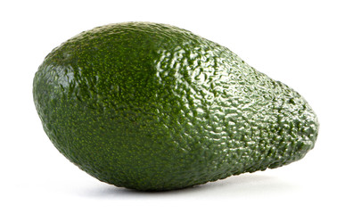 Green avocado closeup on a white background