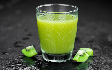 Kiwi Smoothies on a slate slab (selective focus)