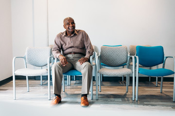 Mature man waiting in medical office