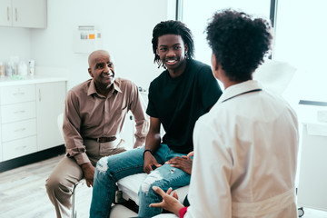 Doctor talking with male patient