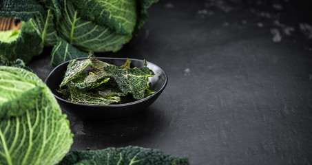 Some fresh made  Savoy Chips on a vintage slate slab (selective focus)