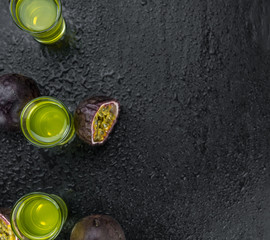 Fresh Passion Fruit Liqueur as detailed close-up shot (selective focus)