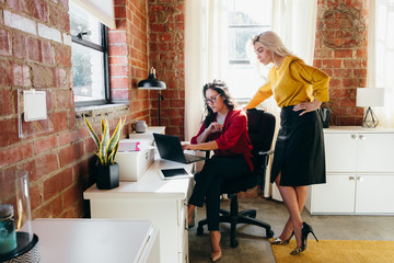 Coworkers collaborating on project