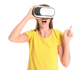 Young woman with virtual reality glasses on white background