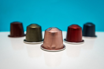 colorful coffee capsules arranged in different forms