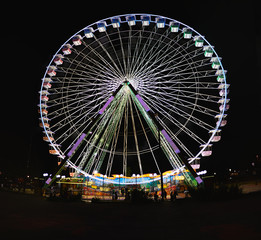 Ferris wheel at night illuminated in Avignon France