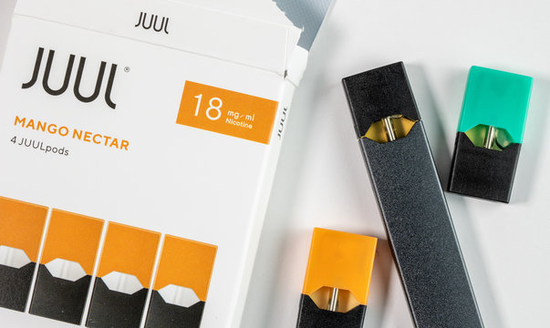 Juul Labs Vaping E-cigarette With Mango Nectar Flavored Pod