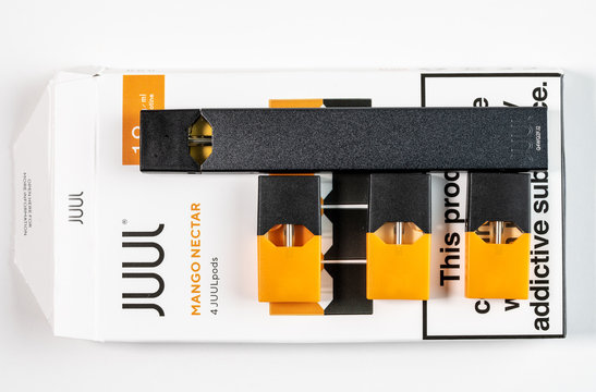 Juul Labs Vaping E-cigarette With Mango Nectar Flavored Pod