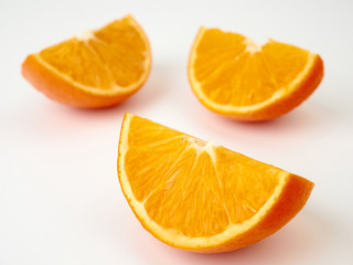 Tangerines or orange Mandarin fruit and peeled slices. A bunch of oranges and half.