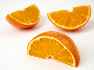 Tangerines or orange Mandarin fruit and peeled slices. A bunch of oranges and half.
