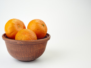 Tangerines or orange Mandarin fruit and peeled slices. A bunch of oranges and half.