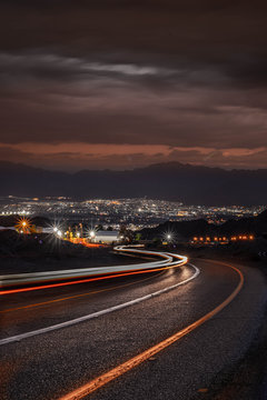 highway long exposure vehicle light trails curvy highway between mountains eilat israel	