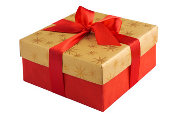 Red gift or present box with golden colored top and red ribbon bow isolated on white background