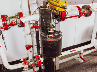 A container for sampling commercial oil at a metering site. Dispensing method of sampling oil with...
