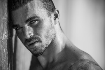 Handsome and fit Caucasian male on the beach