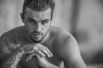 Handsome and fit Caucasian male on the beach