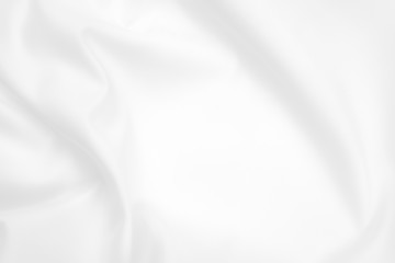 Fototapeta premium Abstract white fabric texture background. Cloth soft wave. Creases of satin, silk, and cotton. 