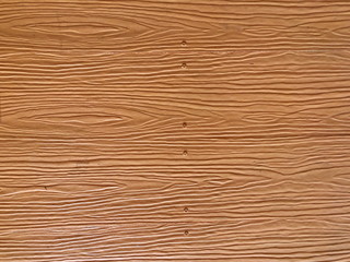 Fototapeta na wymiar Texture background of brown artificial wood board 