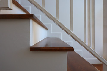 white steel balustrade on brown wooden stair interior decorated modern style of residential house