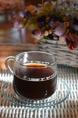 hot americano black coffee drink put on table in the morning day