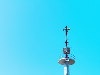 Low Angle View of Communication Tower Against Blue Sky