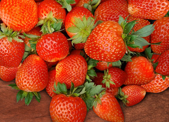 Freshly harvested strawberries. Strawberry background.